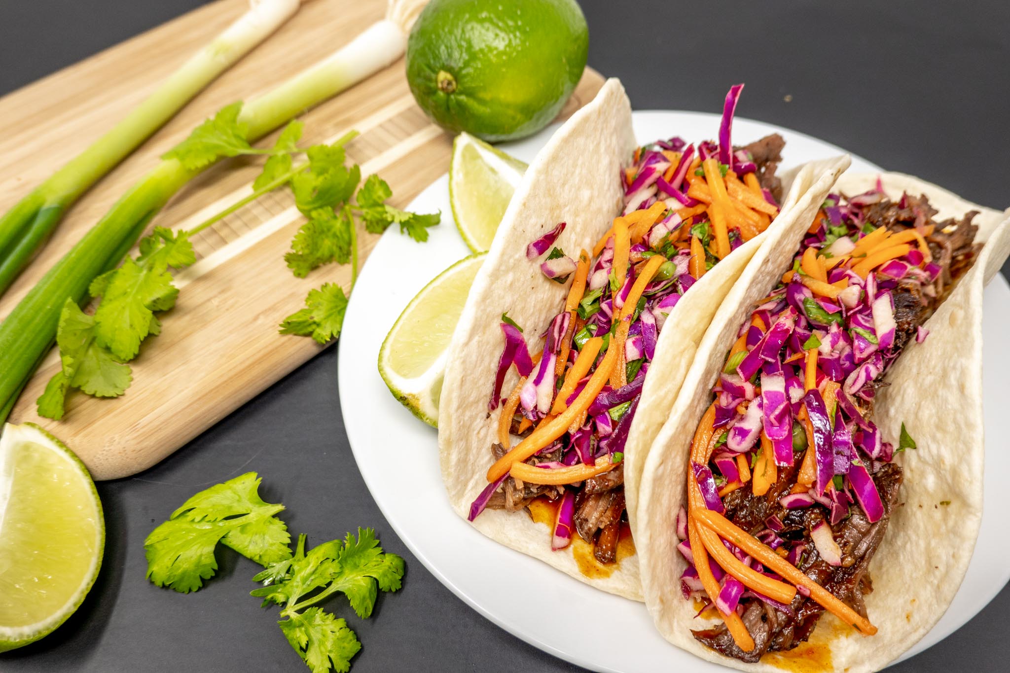 Fiery Fusion: Korean Gochujang Beef Tacos with Kimchi Slaw